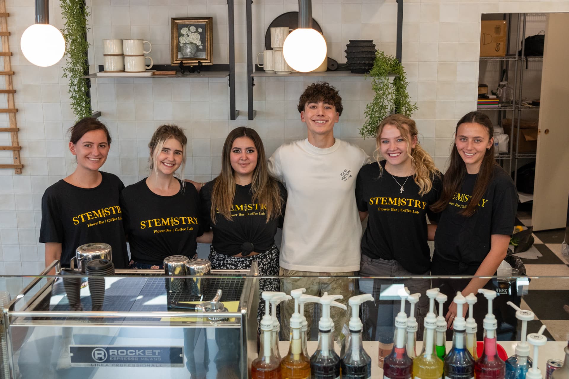 The Stemistry team gathered behind the espresso bar on opening day.